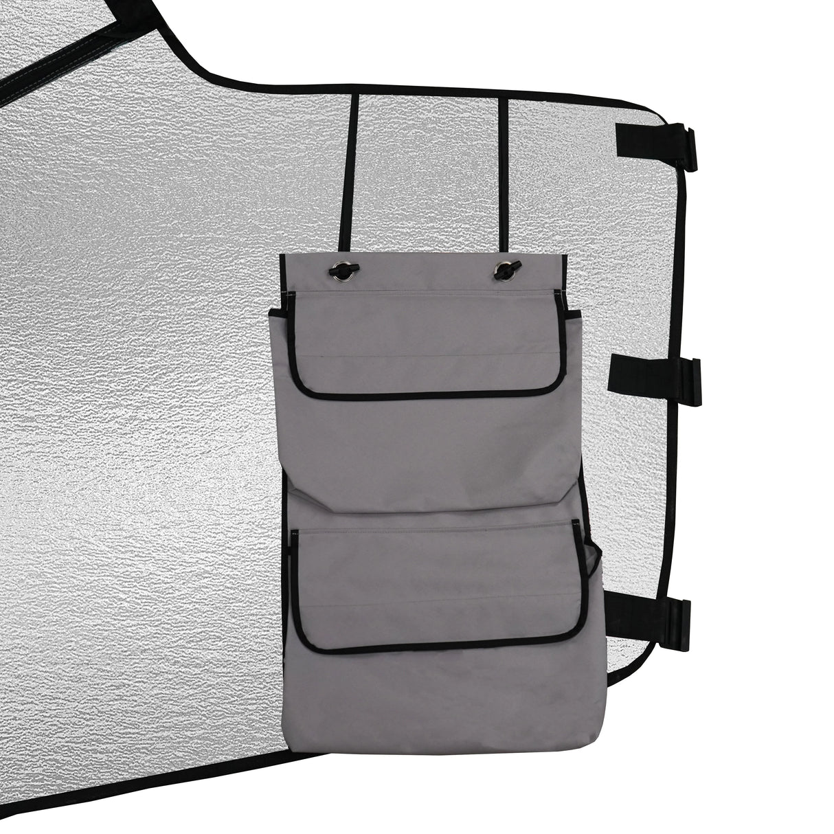 Motorhome screen cover featuring a reflective silver surface and a gray storage pocket with two compartments and black trim