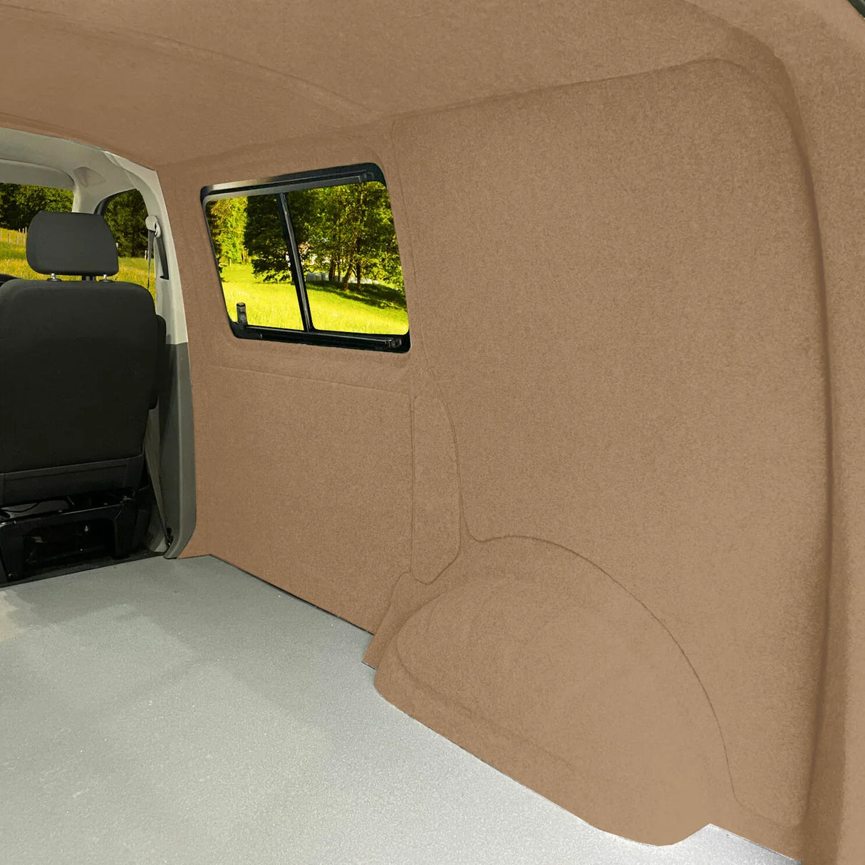 Beige van carpet lining with a soft texture, covering the interior walls and floor, enhancing insulation and aesthetics