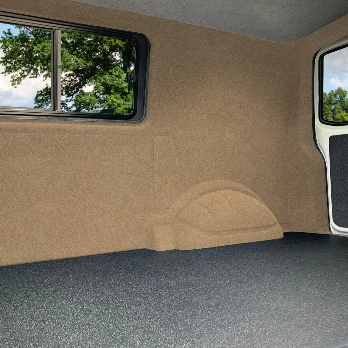 Beige van carpet lining showcases a smooth, textured surface, fitting snugly against the interior walls and floor for a clean look