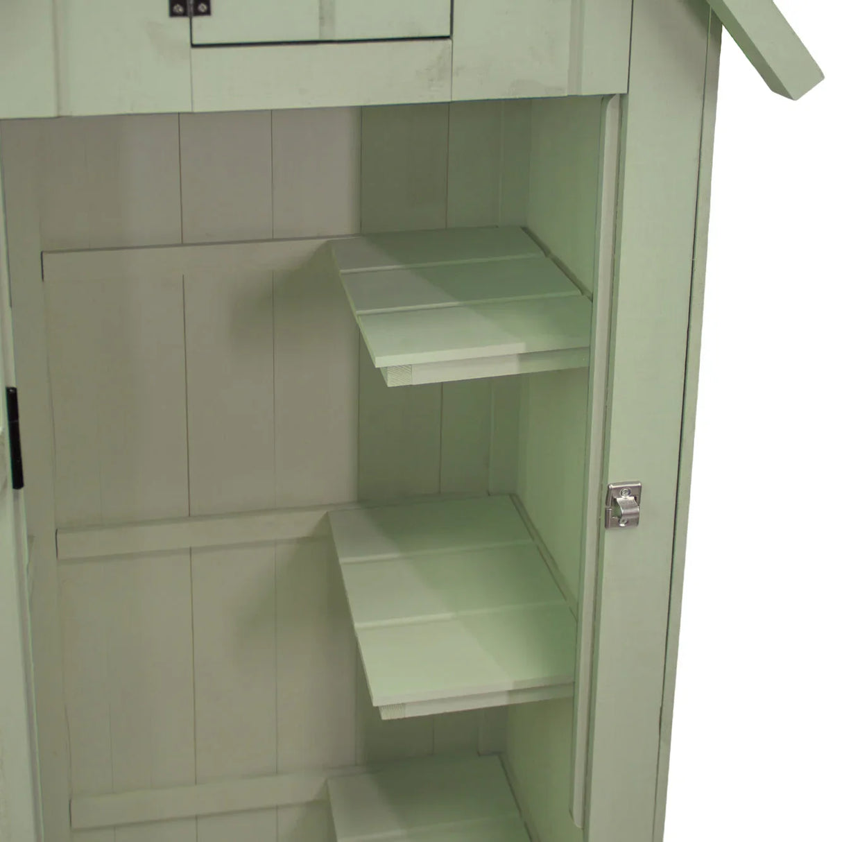 Interior view of a green wooden garden shed featuring three spacious shelves and a light, smooth finish for easy organization