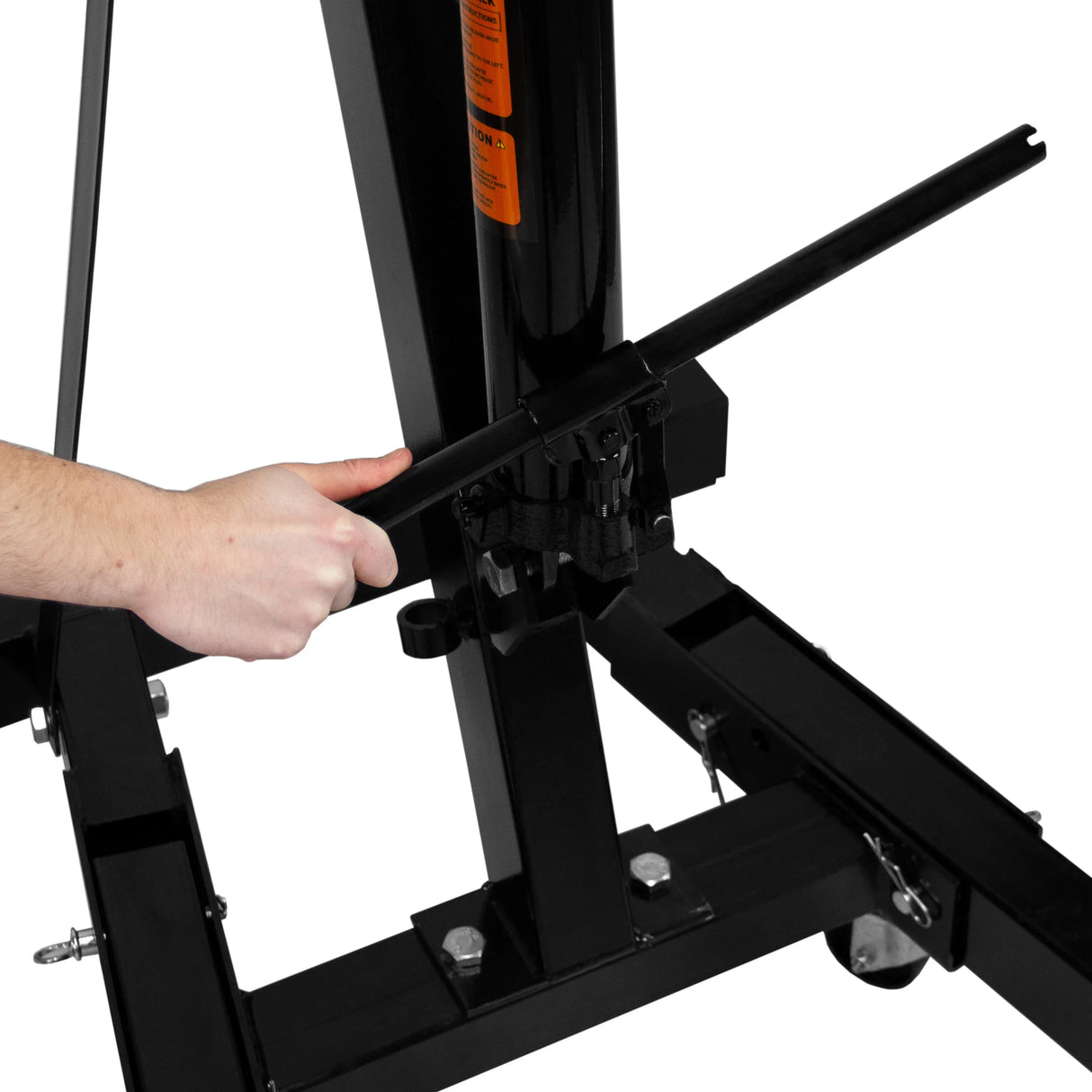 Hydraulic engine crane with a sturdy black frame, showcasing a hand gripping the lever for lifting, designed for 2-ton capacity