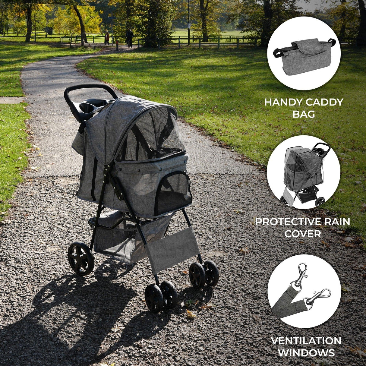 Pet stroller in woven grey with a protective rain cover, caddy bag, and ventilation windows, set on a park path