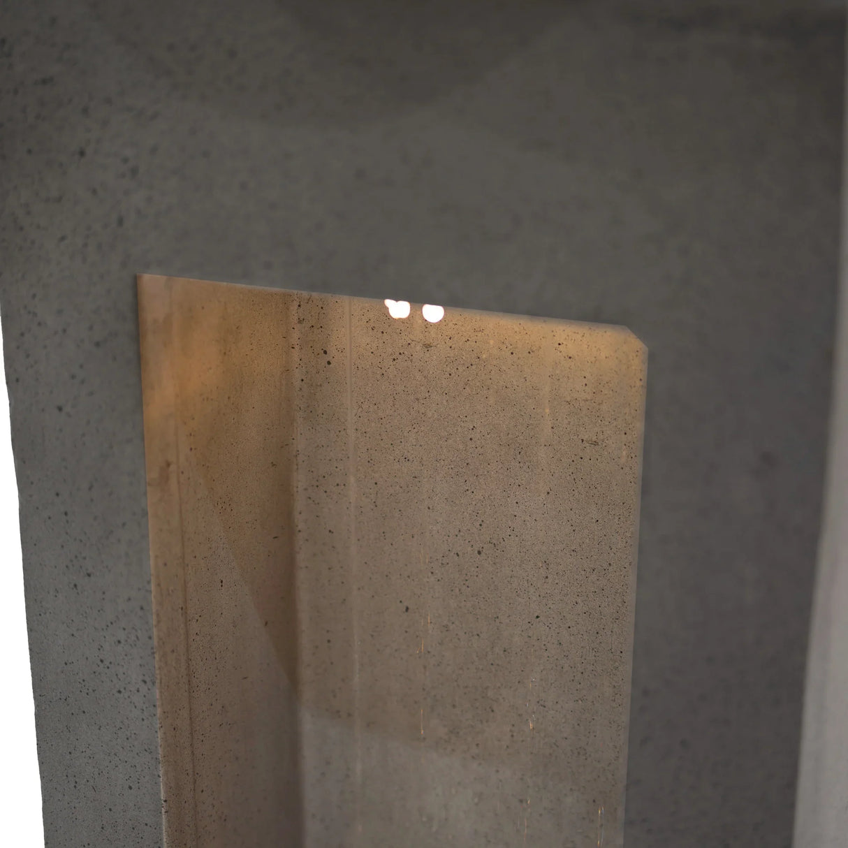 Serenity Falls electric water feature with sleek concrete design, illuminated water flow, and modern minimalist aesthetic