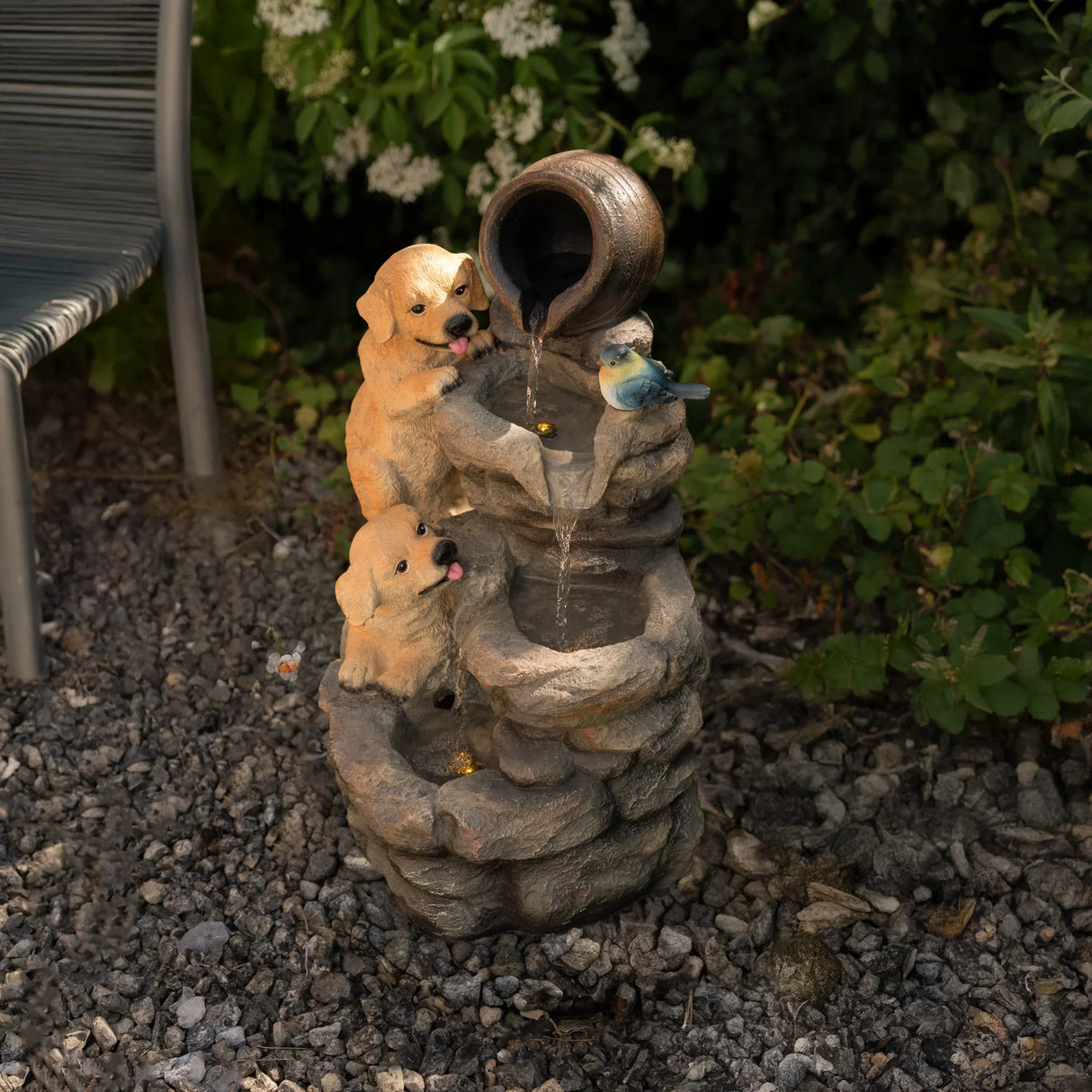 Canine Creek electric water feature with playful puppy sculptures, stone texture, and a charming bird, perfect for outdoor decor