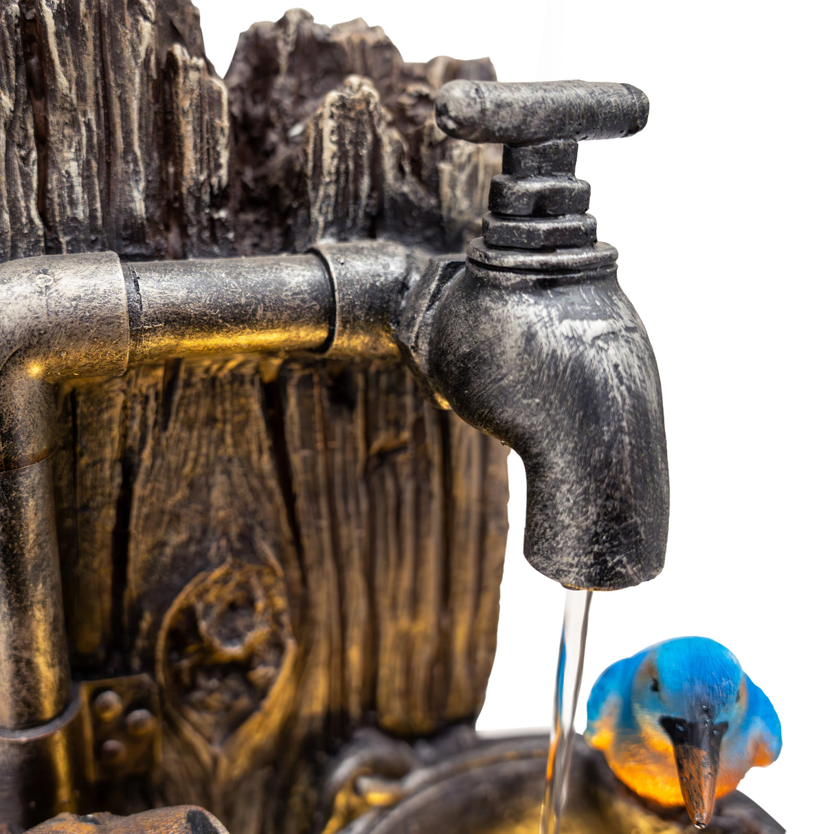Electric water feature Otter Oasis with realistic otter design, textured stone finish, and flowing water from a vintage faucet