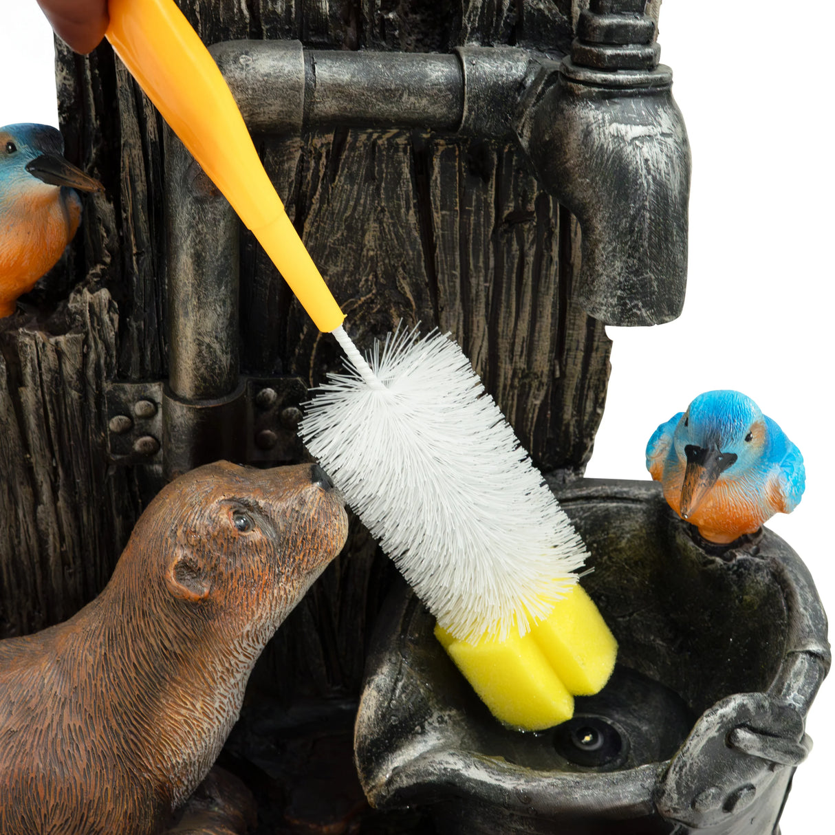 Colorful otter and birds around a rustic water feature, with a yellow cleaning brush gently scrubbing the fountain's basin