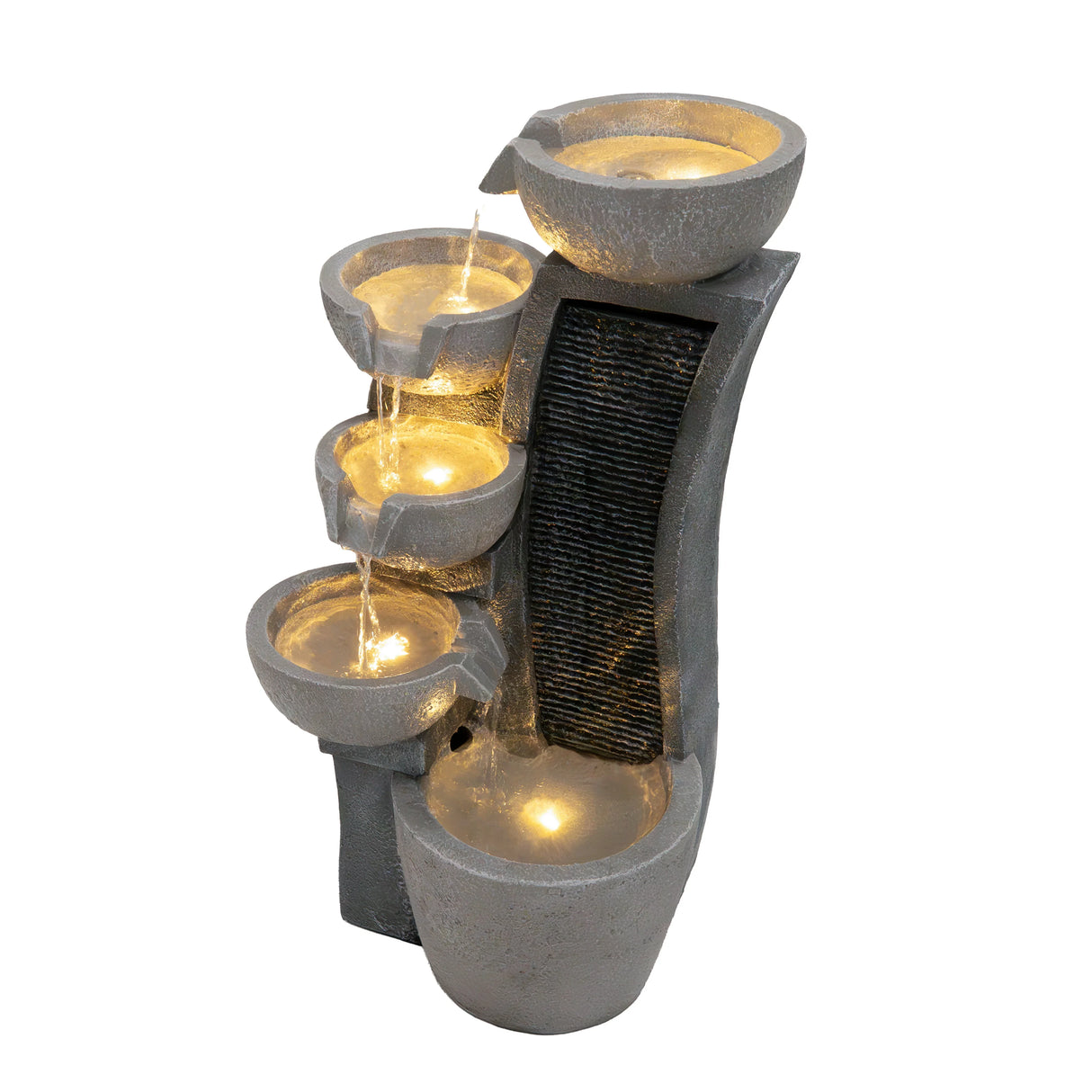 Sleek electric water feature with four cascading bowls, illuminated by soft lights, set against a textured gray stone backdrop