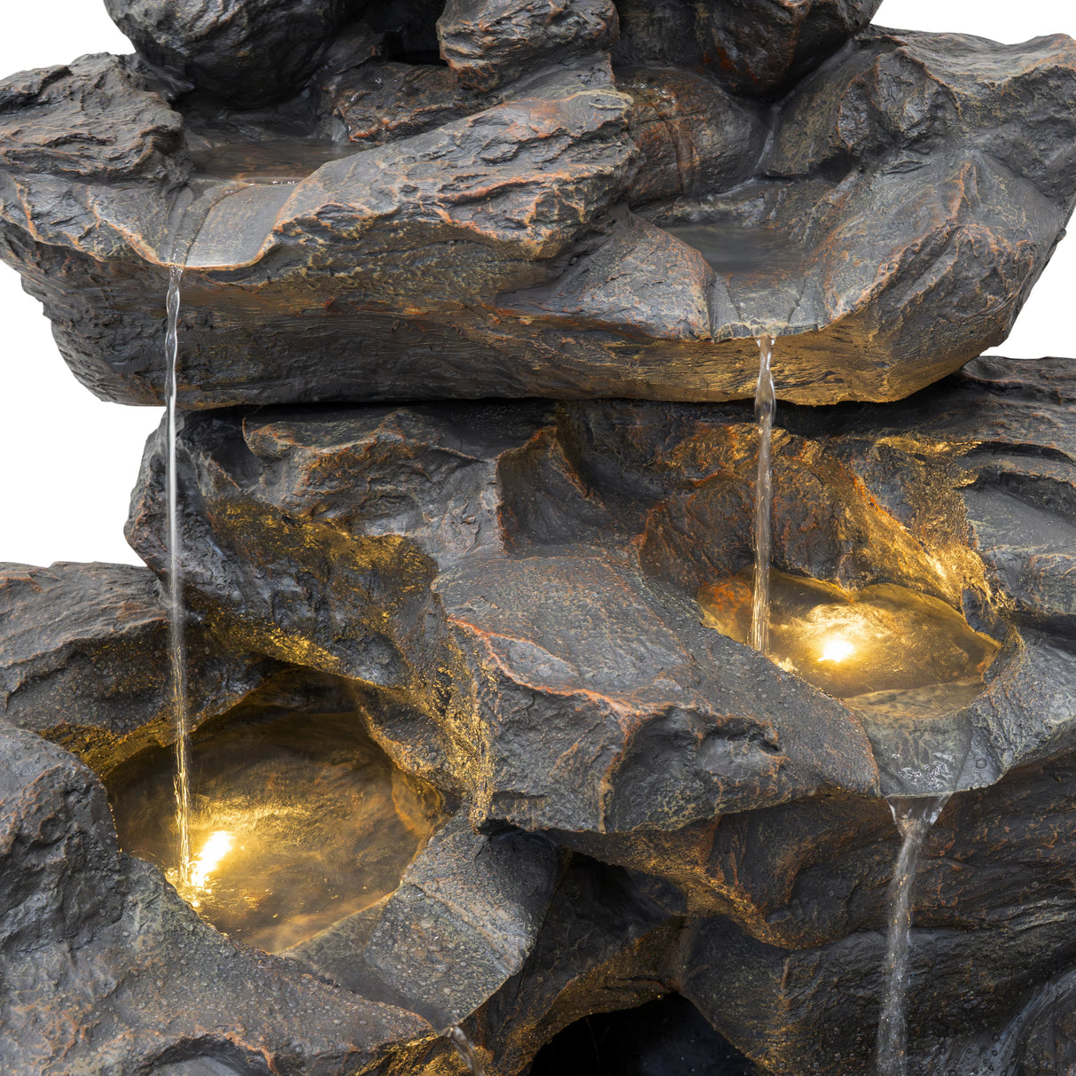 Rustic Rapids electric water feature with cascading water over textured rock formations and illuminated pools for a serene ambiance