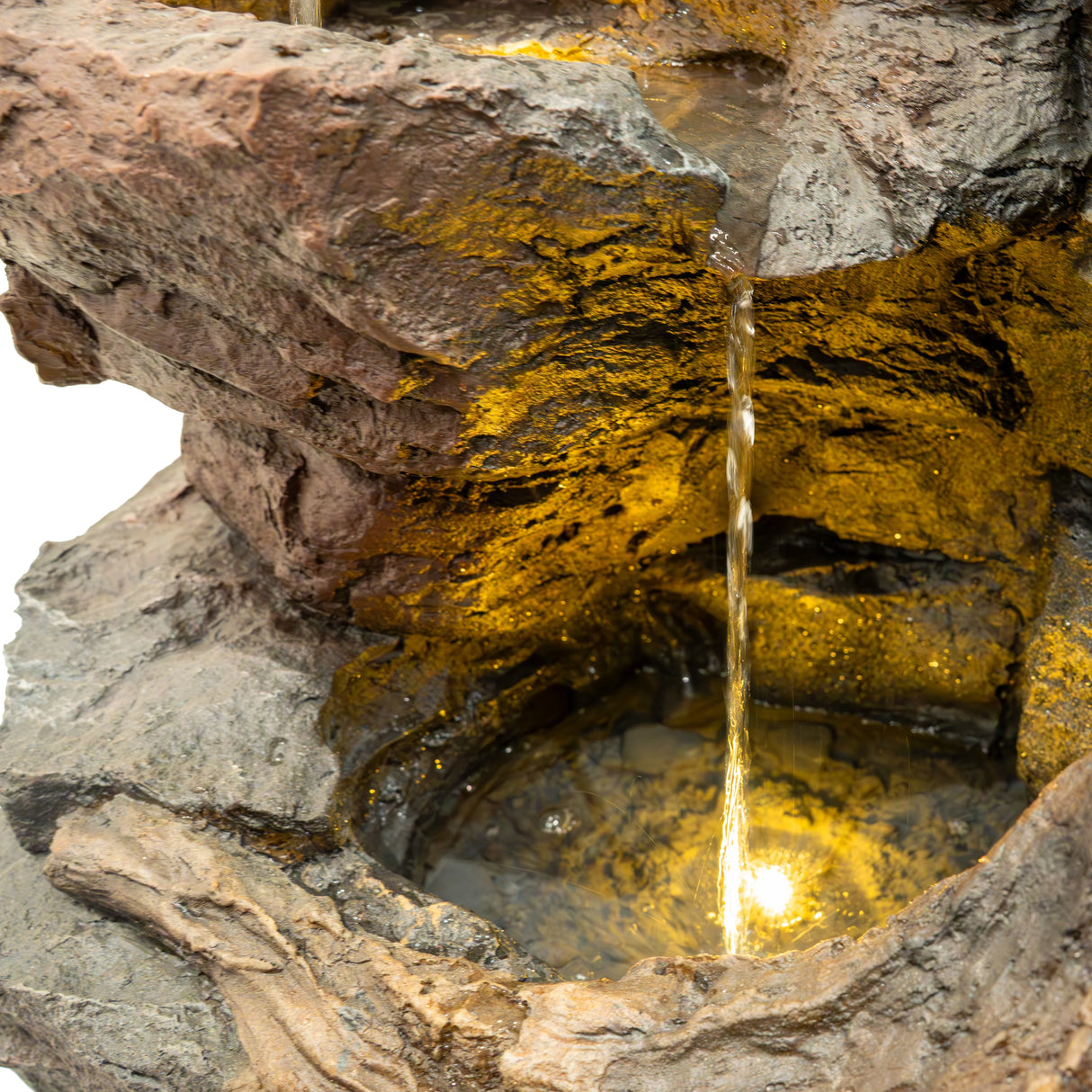Electric Water Feature - Willow Springs with realistic rock texture, cascading water flow, and warm LED lighting illuminating the basin