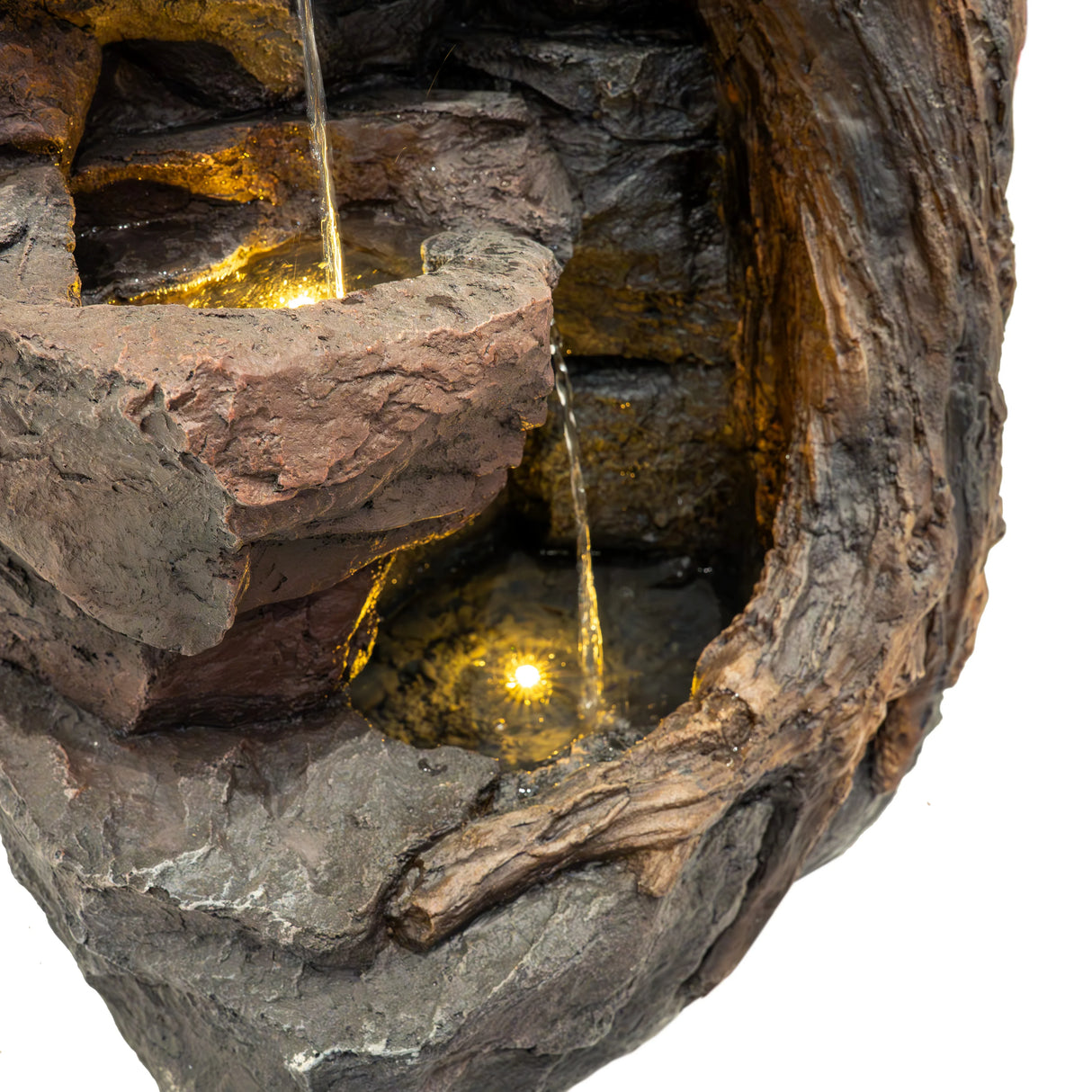 Electric water feature with cascading water, textured stone finish, warm LED lights, and natural rock-like design in earthy tones