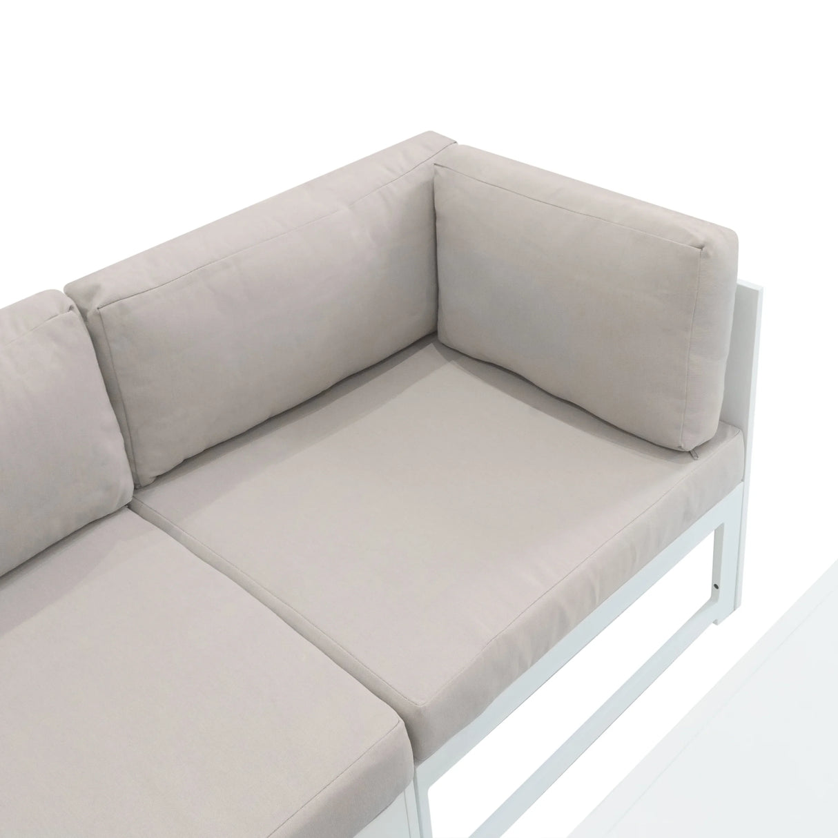 Modular garden furniture set featuring a white frame and soft beige cushions, designed for comfort and outdoor relaxation