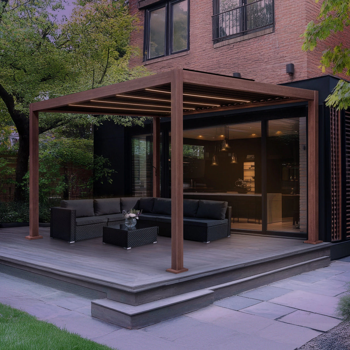 Wood effect aluminium pergola with integrated LED lights, featuring a modern design, set over a stylish outdoor seating area