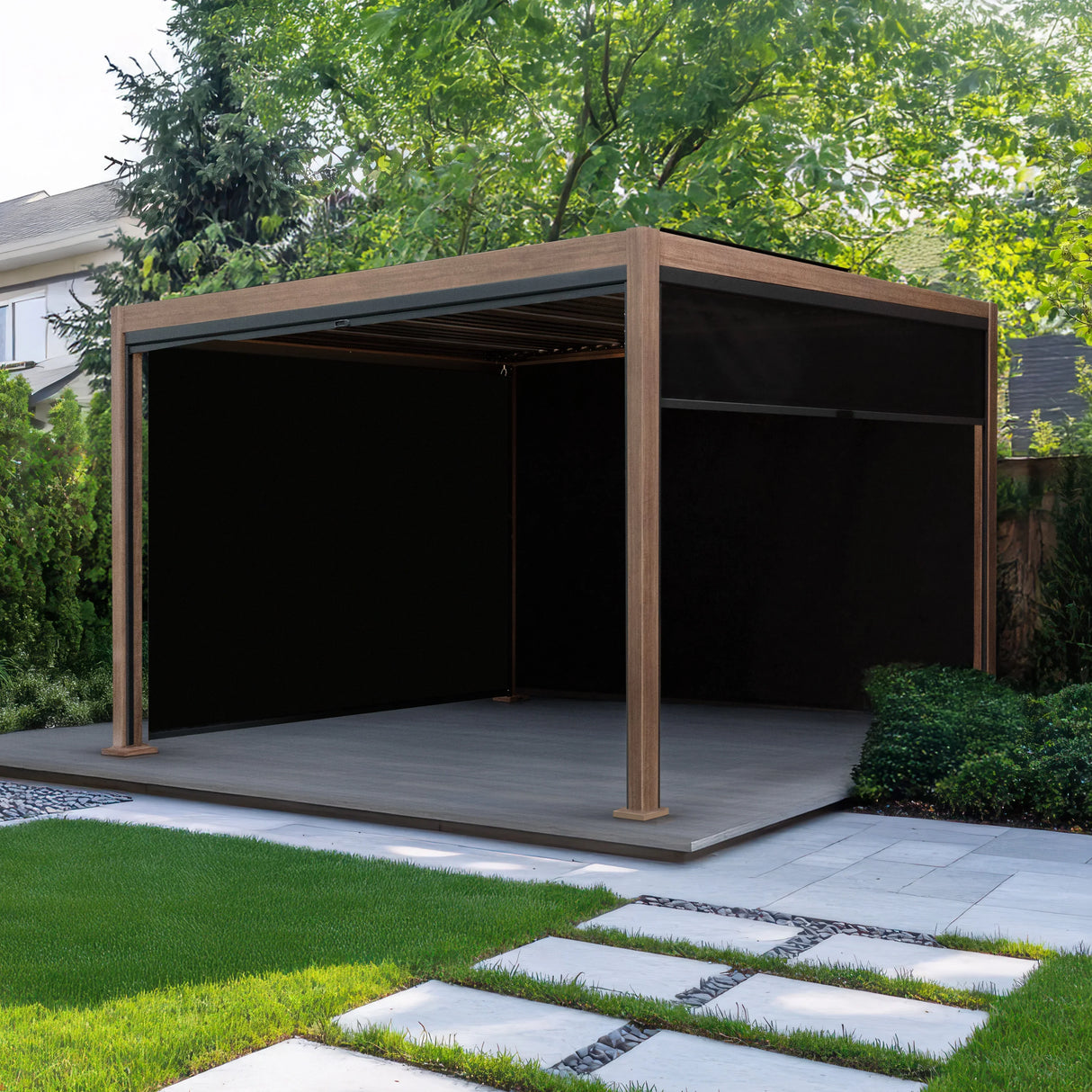 Wood effect aluminium pergola with blinds, 3m x 3m, featuring a sleek design, dark blinds, and a modern outdoor setting with greenery