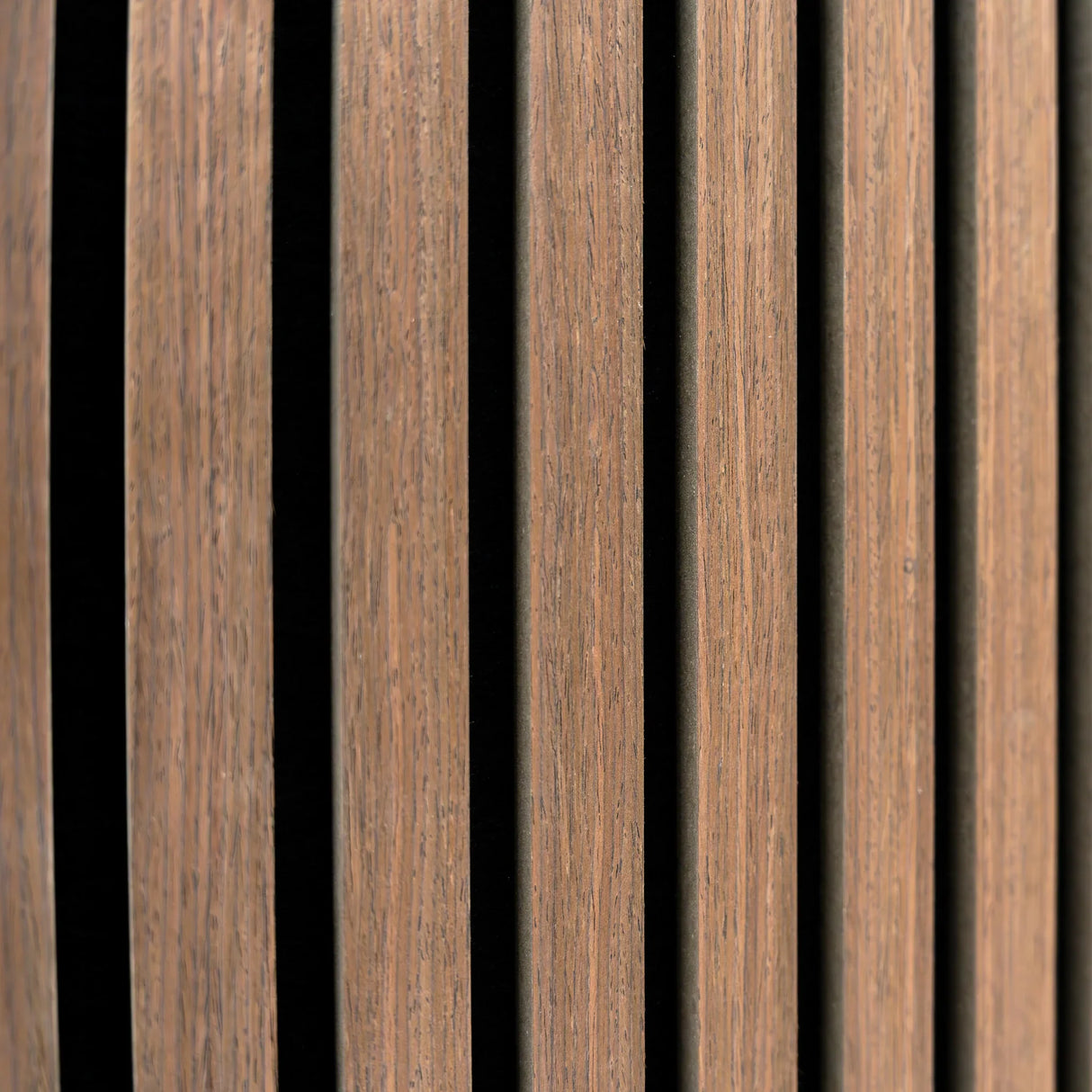 Acoustic slat wall panel in dark walnut finish, featuring vertical slats with a smooth texture and contrasting black grooves