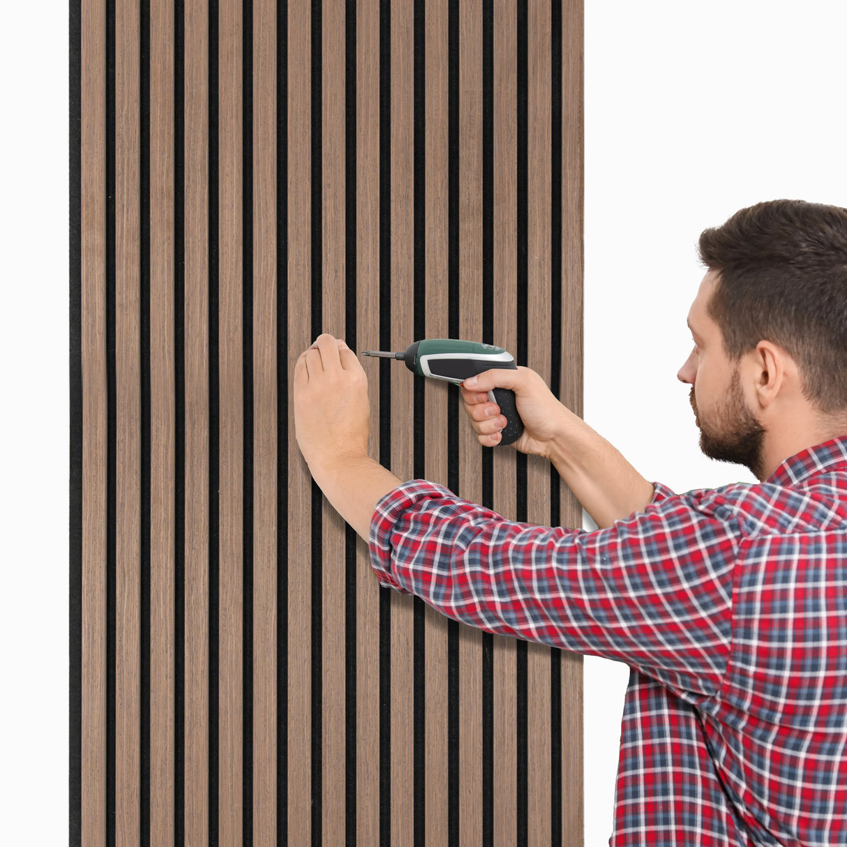 Dark walnut acoustic slat wall panels being installed, featuring a sleek design with vertical slats and a rich wood texture