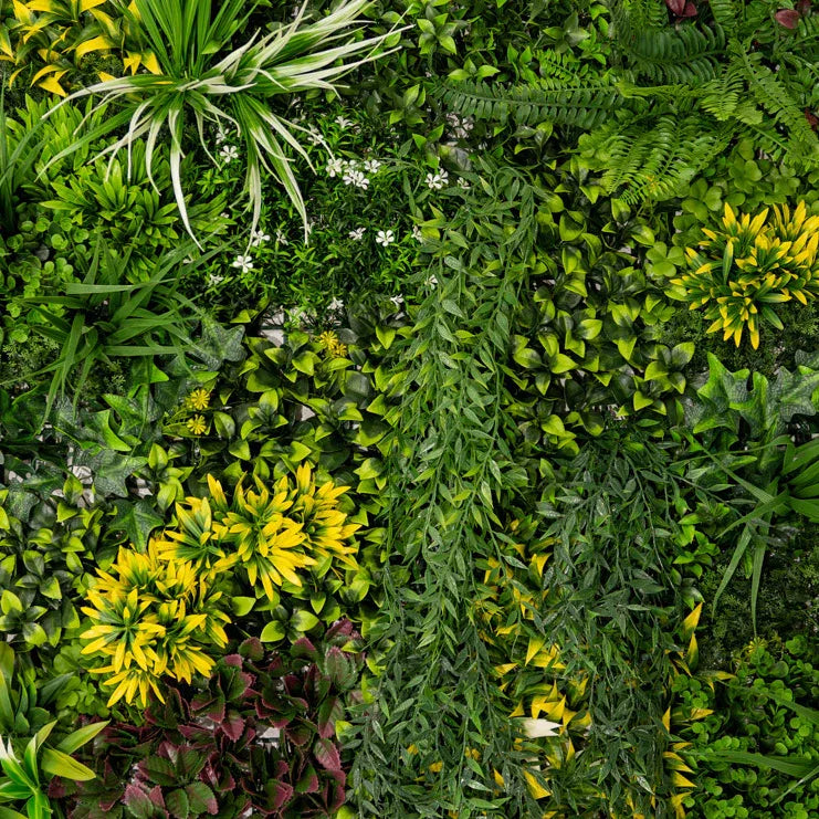 Lush green Cassia artificial wall tile featuring various textured leaves and vibrant yellow accents, ideal for indoor decor