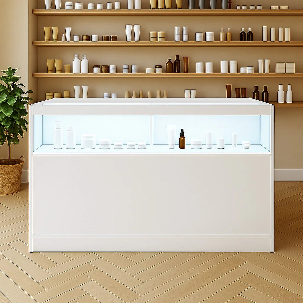 LED retail shop counter B1500 in sleek white finish, featuring illuminated display for showcasing products against a minimalist backdrop