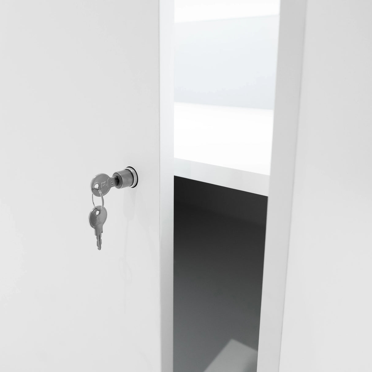 White LED retail shop counter B1500 featuring a sleek design with an open shelf and a key lock for secure storage