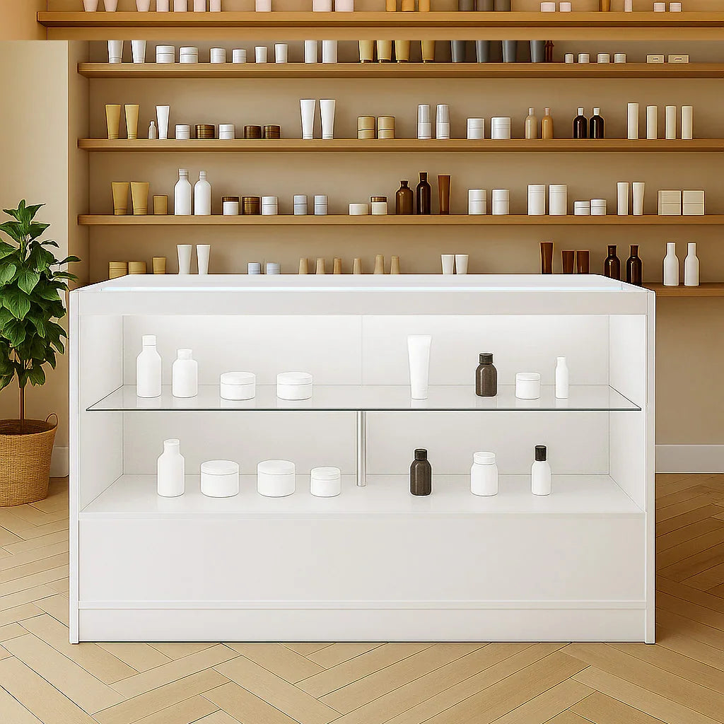 LED retail shop counter C1500 in white, featuring glass shelves displaying various skincare products against a warm, neutral backdrop