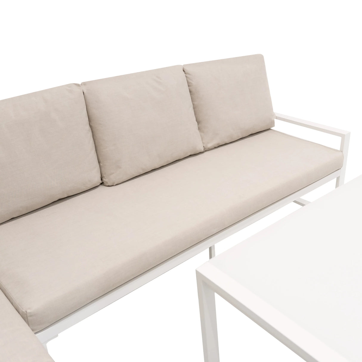 Stylish white aluminium corner sofa set featuring soft beige cushions, perfect for outdoor lounging and modern decor