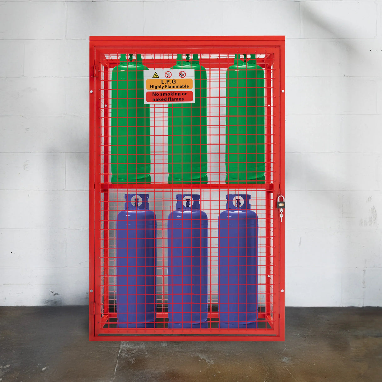 Collapsible red mesh cage for gas bottles, featuring green and blue cylinders, with safety warning signs prominently displayed