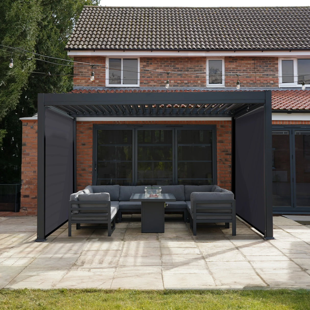 Aluminium pergola with anthracite blinds, 3m x 3m, featuring a modern design and a cozy outdoor seating area with gray cushions