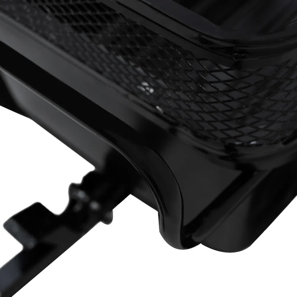 Black metal tipping trailer with a mesh design, featuring a sturdy frame and a secure hitch for easy towing and transport
