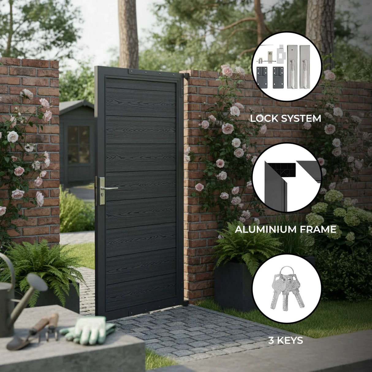 Grey composite panel gate featuring an aluminum frame, lock system, and three keys, set against a brick wall and garden backdrop