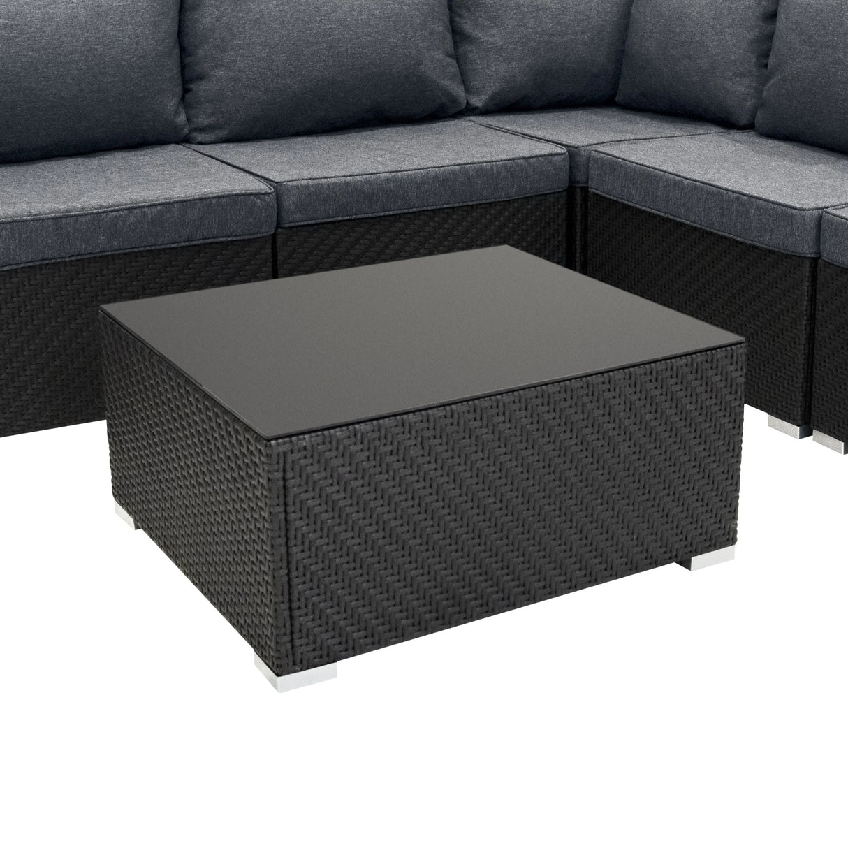 Rattan modular furniture set featuring a sleek black coffee table with a smooth top and textured woven base, ideal for outdoor spaces