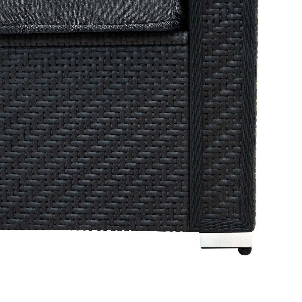 Black rattan modular furniture set with a textured weave, featuring a sleek design and sturdy silver legs for outdoor elegance