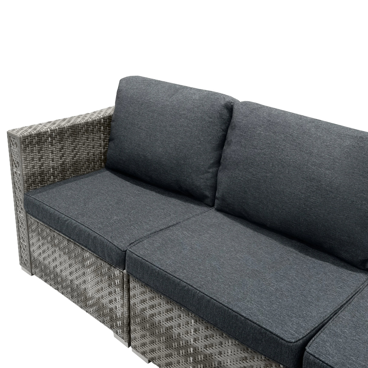 Grey rattan modular furniture set featuring plush cushions, woven texture, and a contemporary design ideal for outdoor lounging