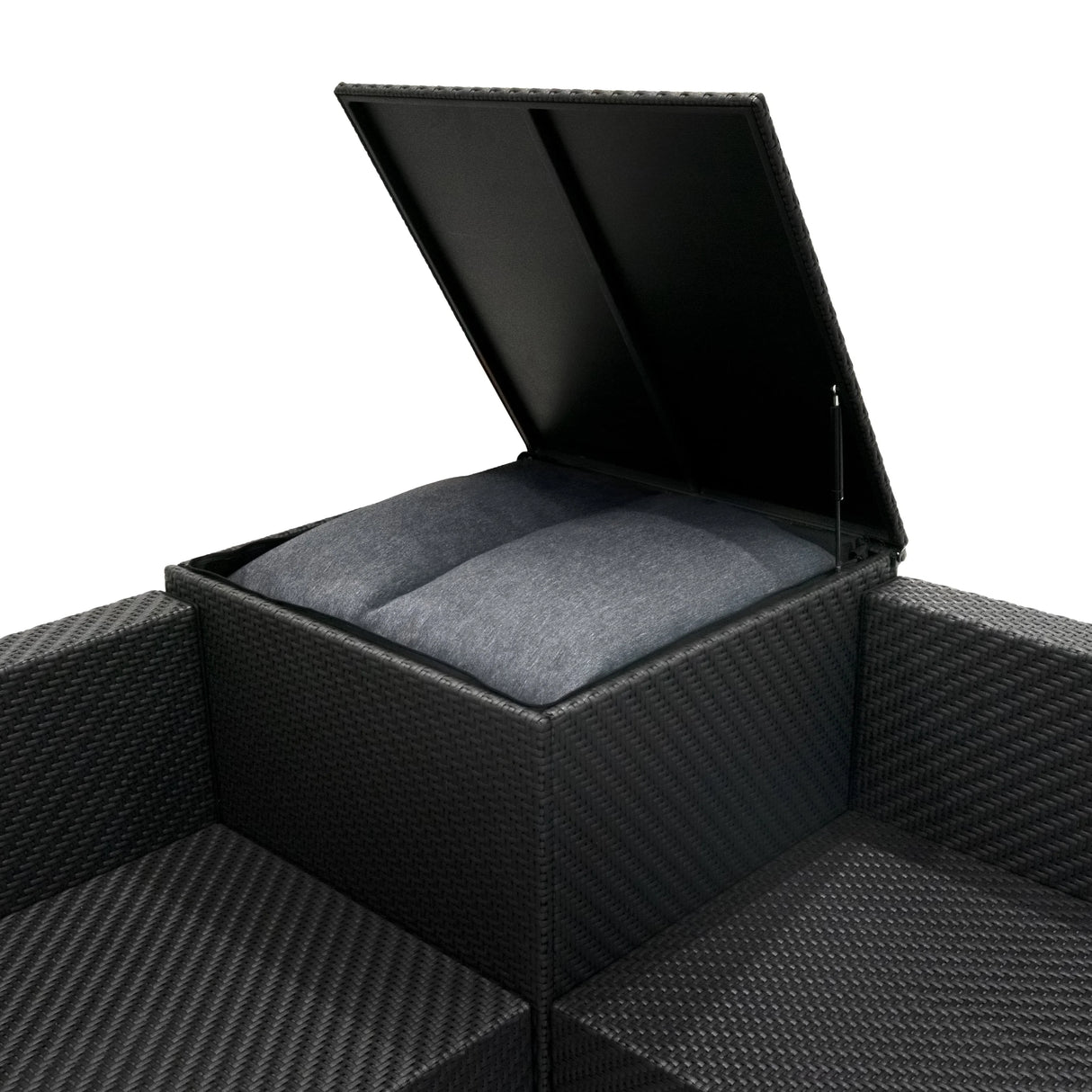 Black rattan modular furniture set featuring a storage ottoman with a cushioned lid, perfect for outdoor relaxation and organization