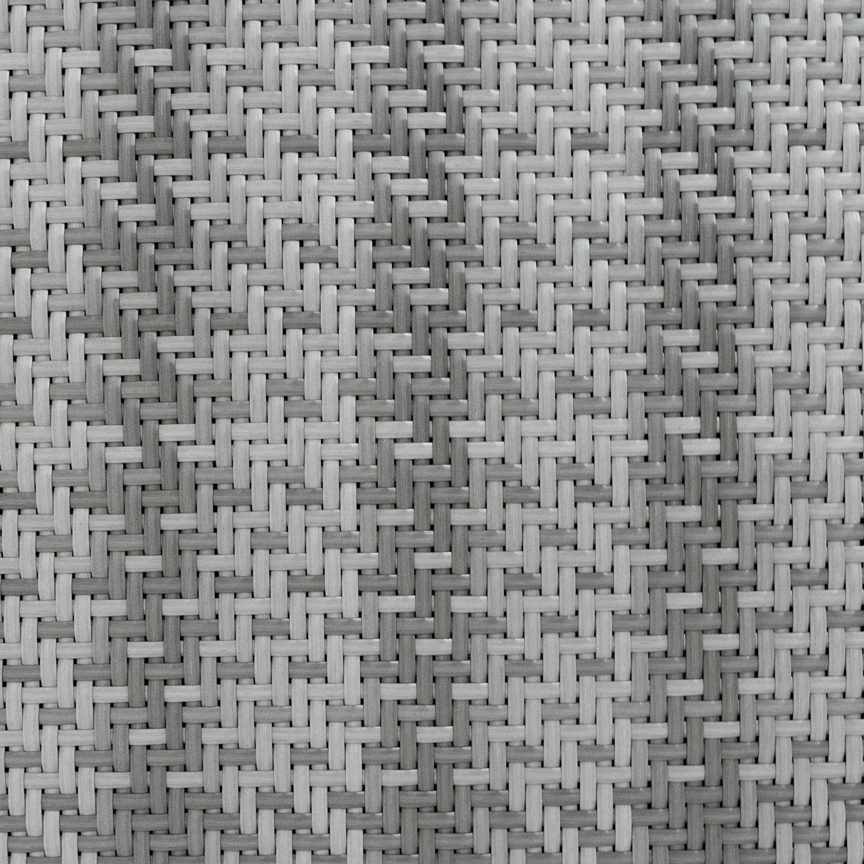 Close-up of grey rattan weave showcasing intricate texture and pattern, ideal for a stylish modular furniture set