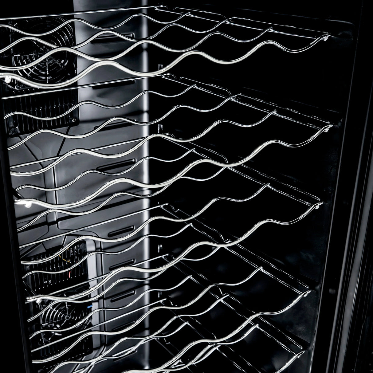 Oriva LED Wine Cooler interior showcasing sleek chrome racks, designed for optimal wine storage with a modern black finish