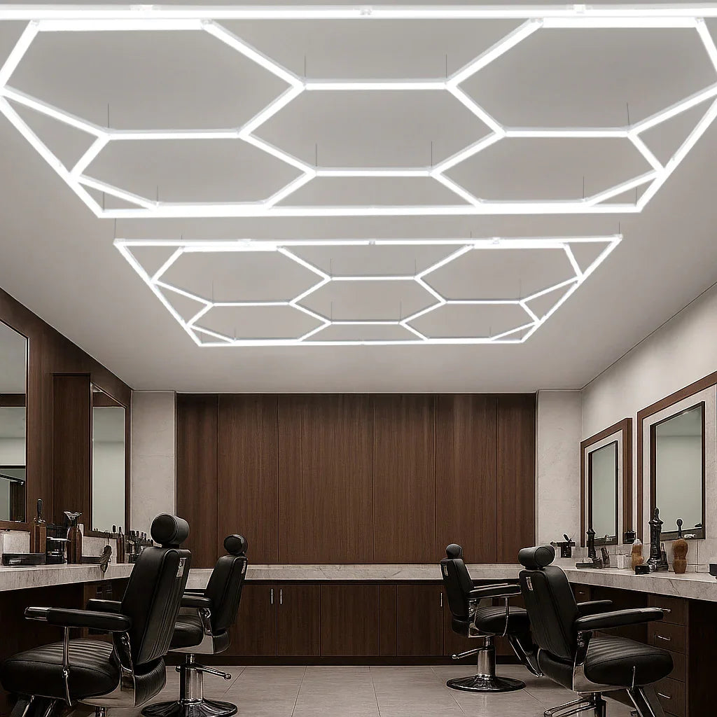 Hexagon LED lighting in a modern salon, featuring sleek white geometric shapes against a stylish wood-paneled ceiling