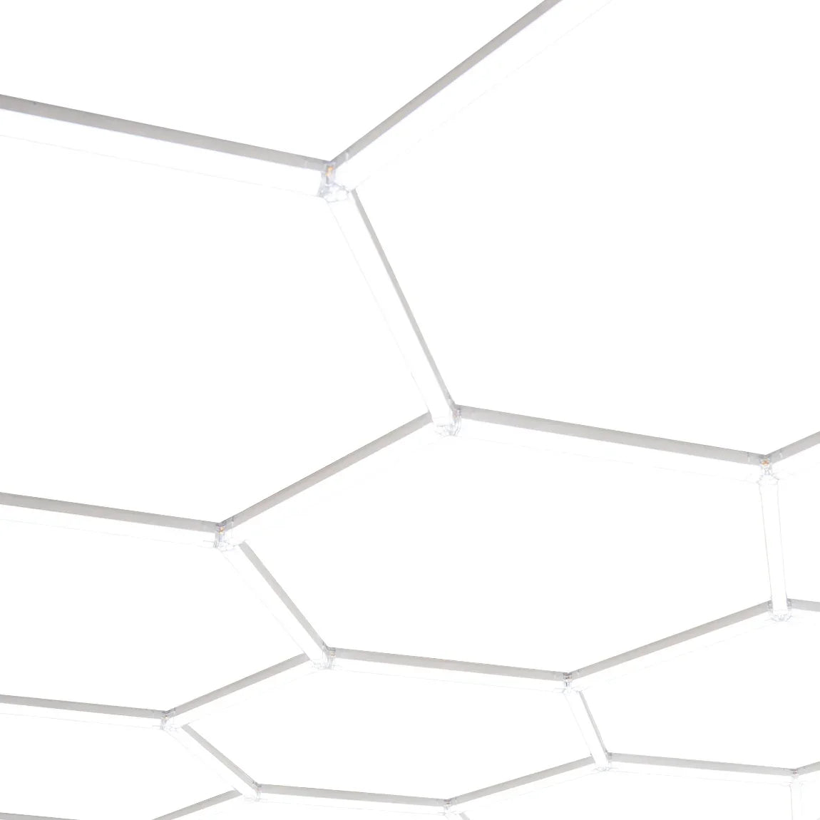 Hexagon LED lighting panels in a modern, geometric design with a sleek white finish, ideal for stylish home or office decor