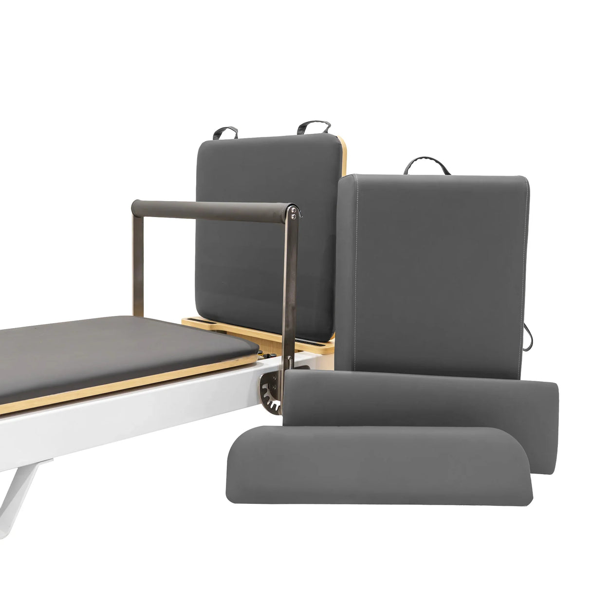 Aluminium Pilates reformer machine with grey padded cushions, adjustable headrest, and sturdy frame for versatile workouts