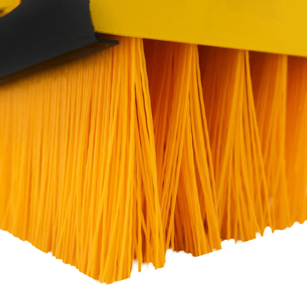 Durable yellow bristles of a forklift sweeper brush, designed for efficient cleaning, showcasing flexibility and robust construction