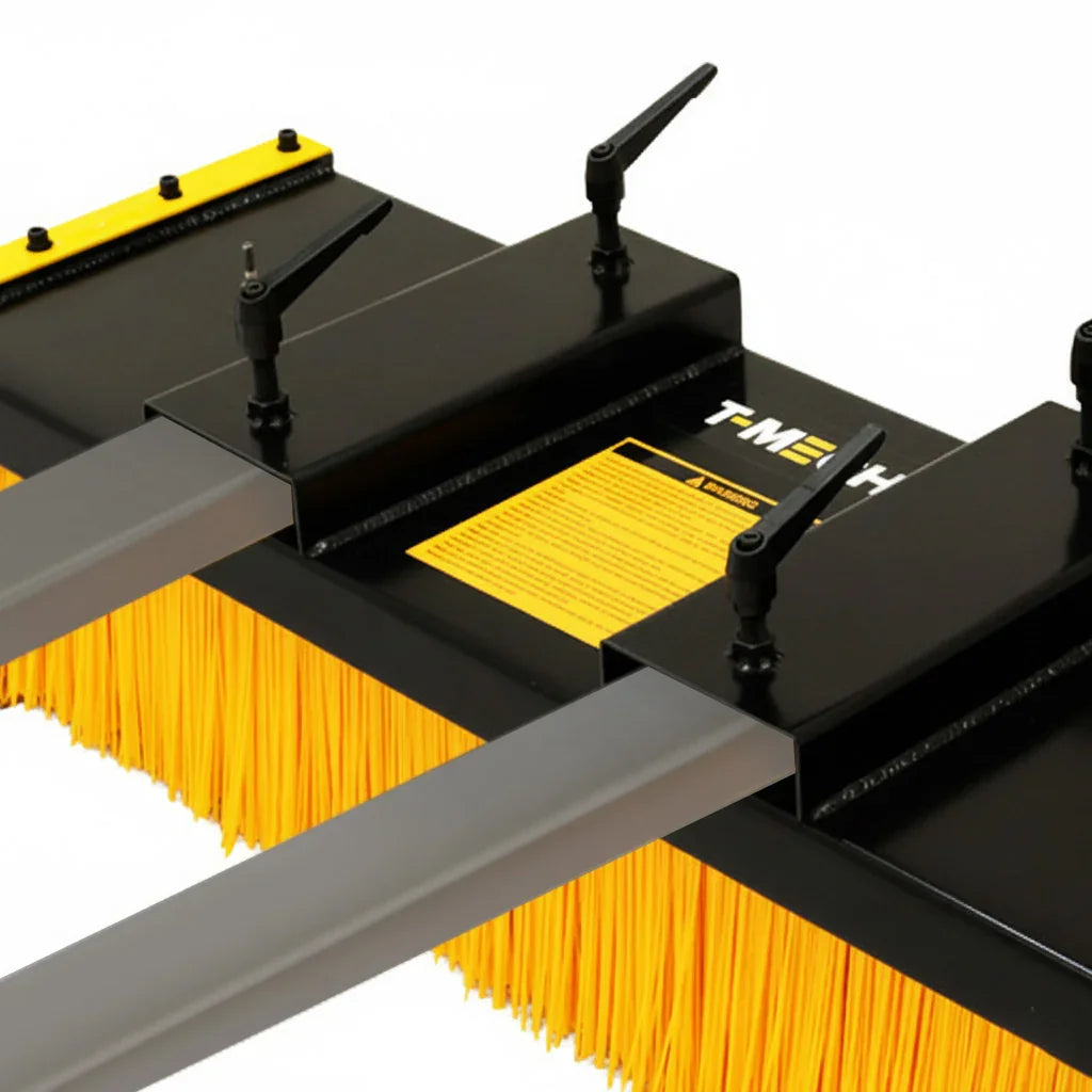 Forklift sweeper brush with bright yellow bristles, sturdy black frame, and adjustable stands for efficient cleaning on various surfaces