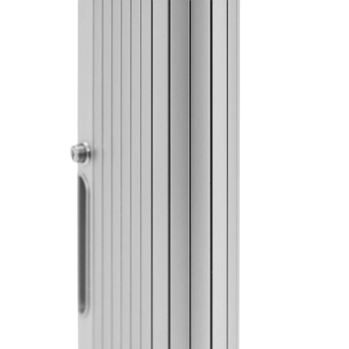 Sleek silver Tambour shower door featuring vertical slats, a smooth finish, and a modern handle for easy access