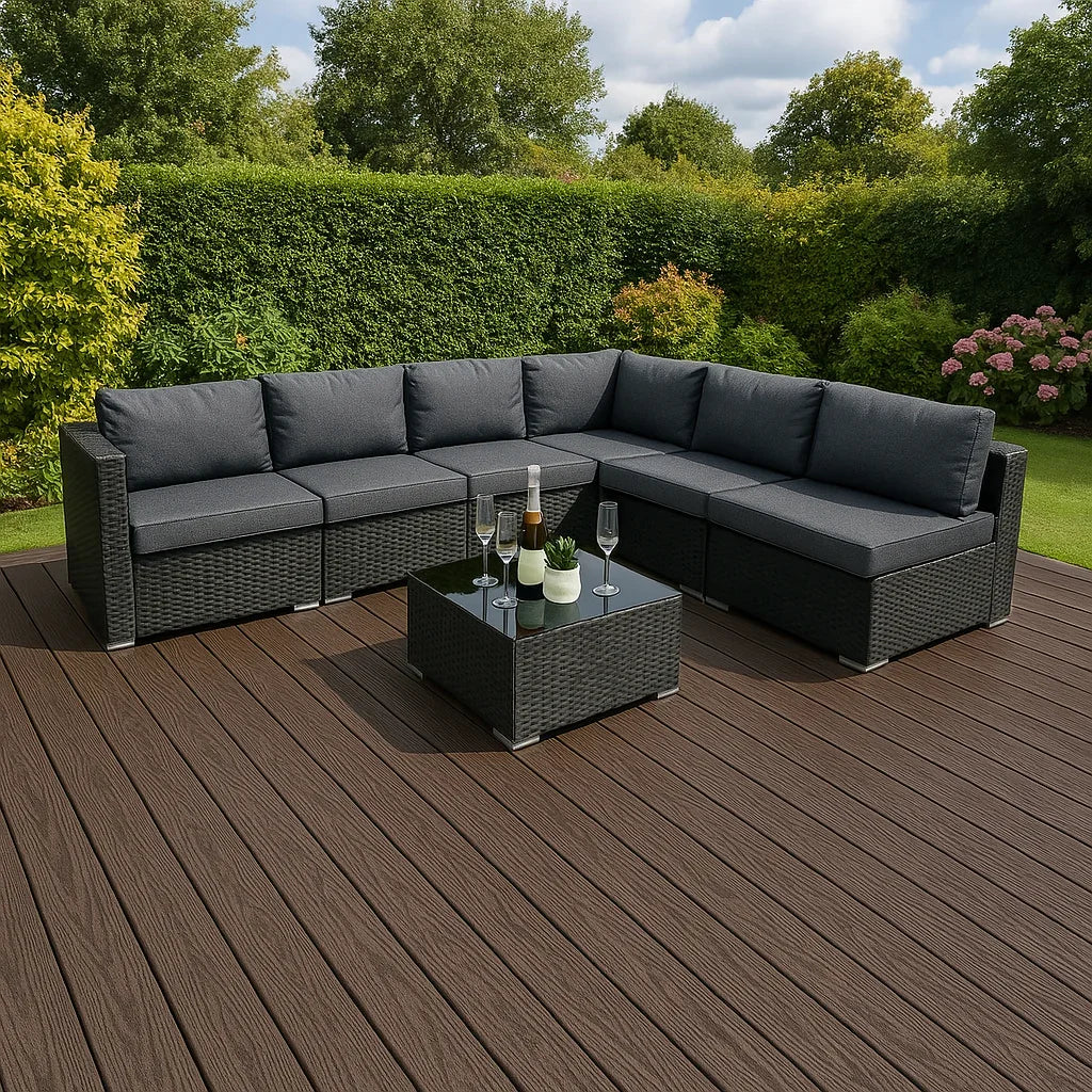 Composite decking boards in rich brown color, featuring a smooth, textured surface, ideal for outdoor spaces and furniture arrangements