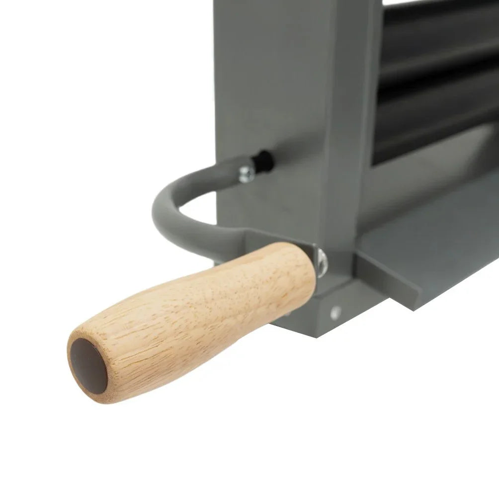 Manual hand wringer with a sturdy metal frame, wooden handle, and rubber rollers for efficient water extraction from fabrics