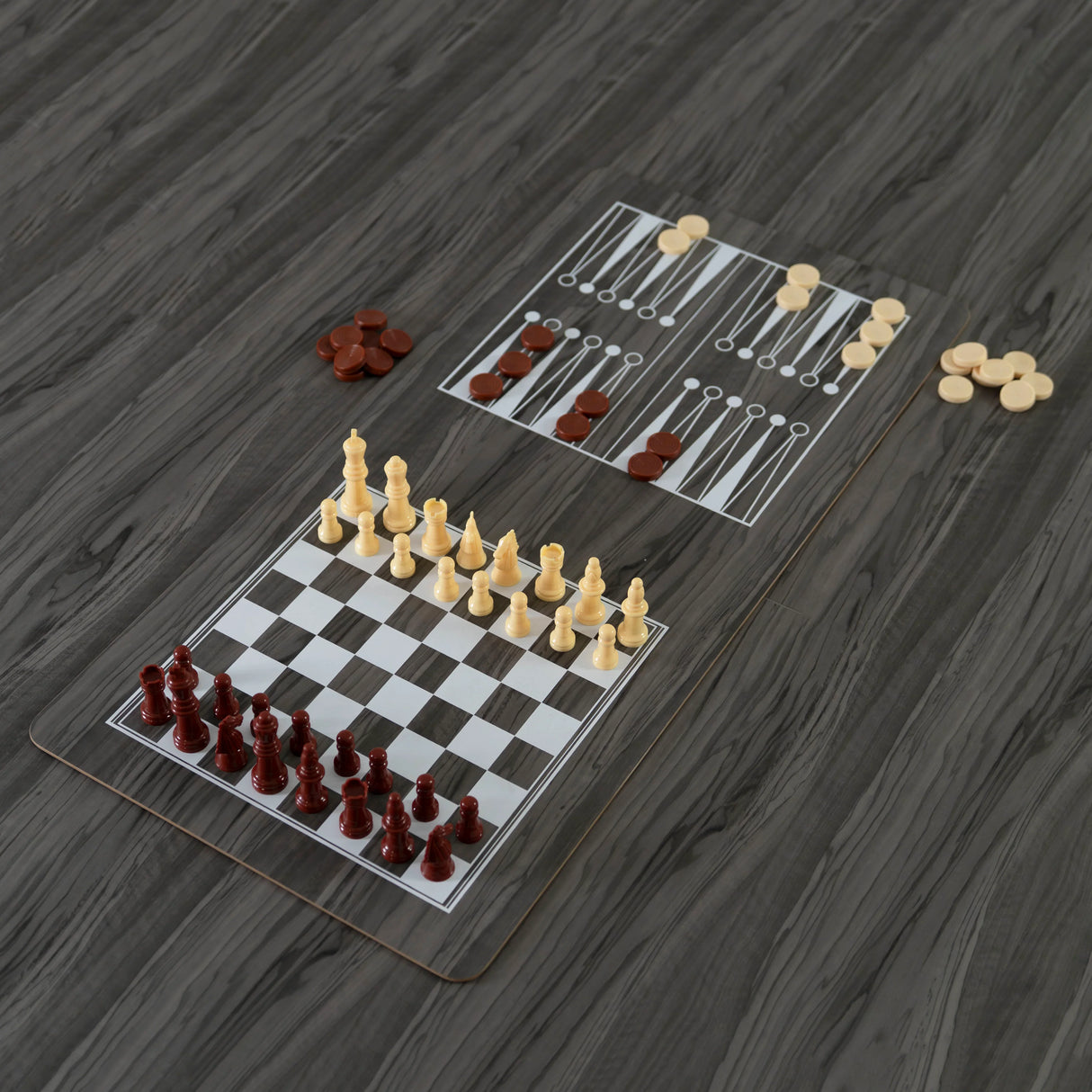 7-in-1 games table in grey featuring a chessboard and checkers layout with smooth, glossy surfaces and contrasting game pieces