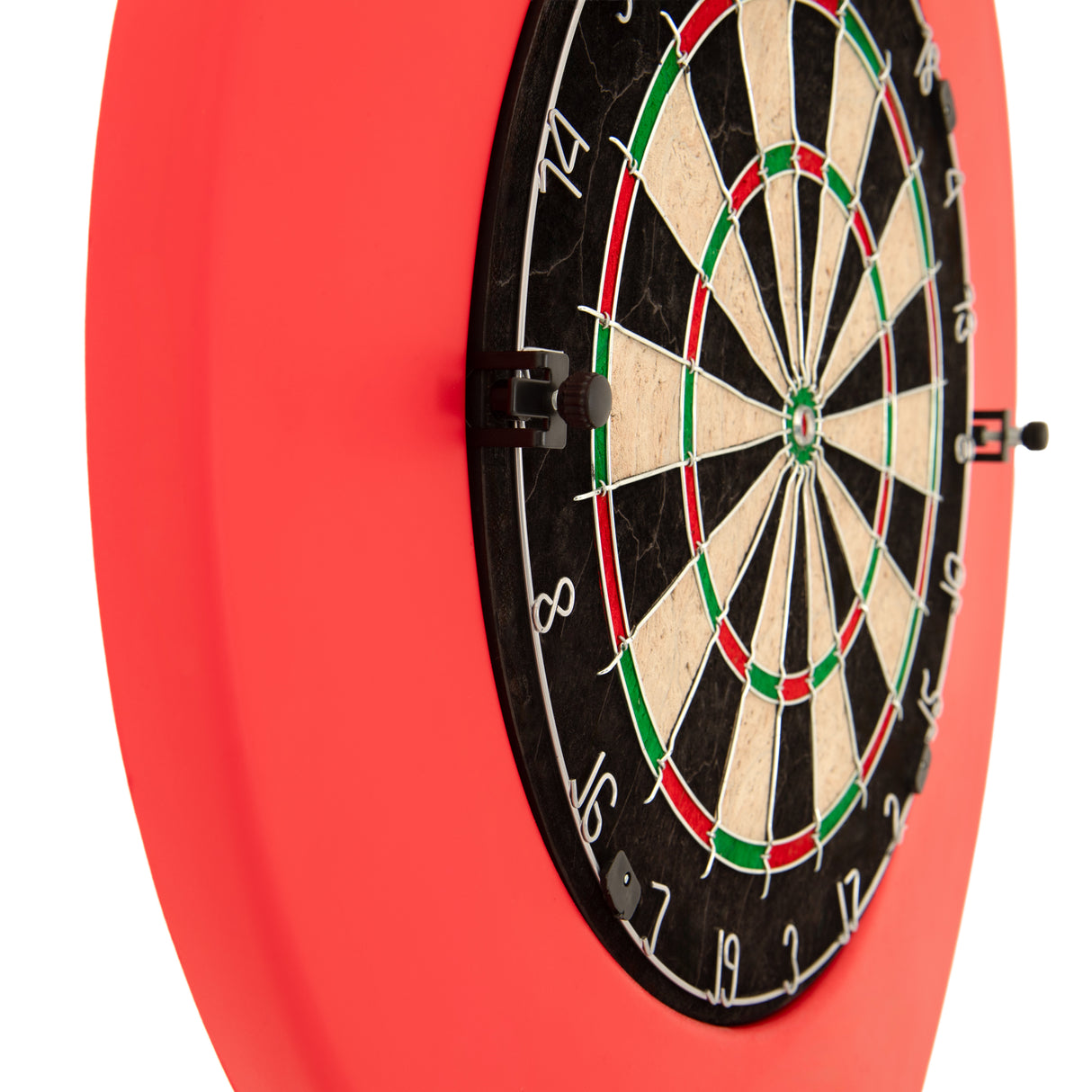 Dart board set featuring a black and white target with red and green accents, mounted on a vibrant red backing for easy visibility