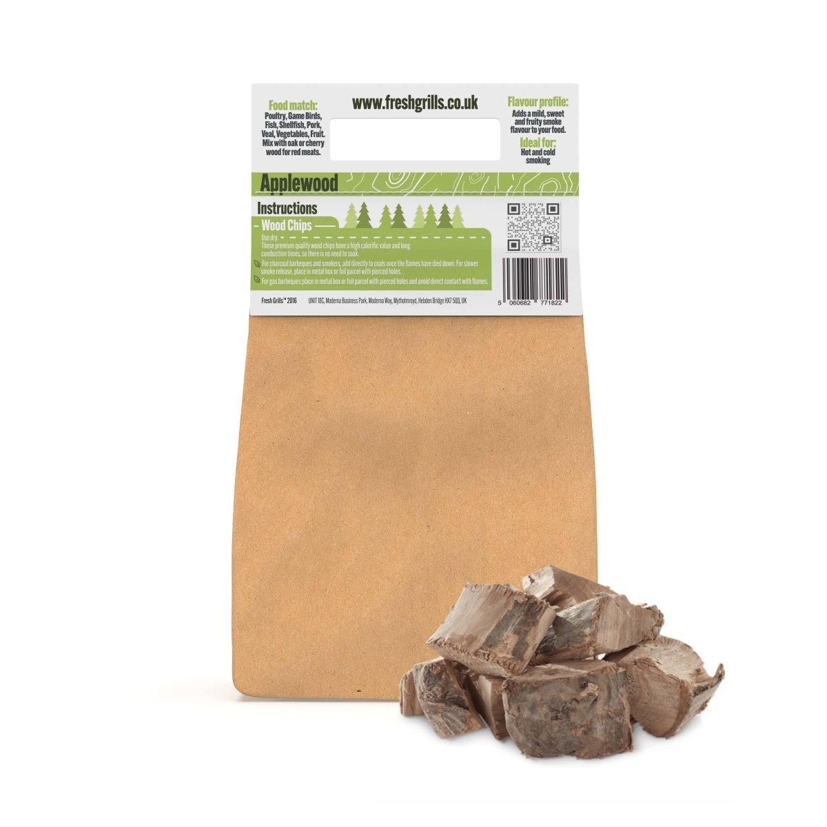 Applewood BBQ smoking wood chips in a resealable brown bag, featuring chunks of wood and clear usage instructions on the back