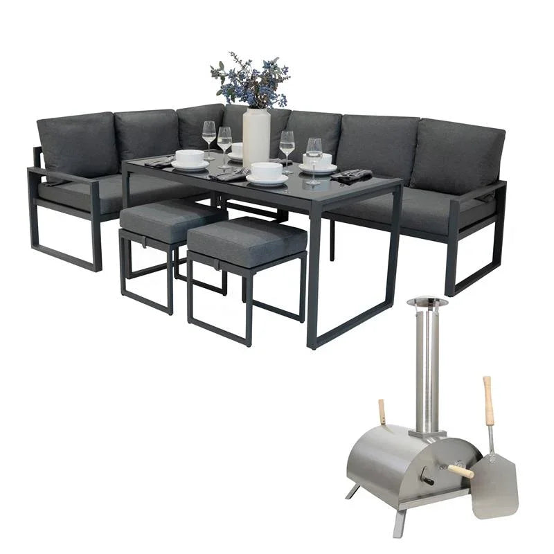 Anthracite grey aluminium corner sofa set with plush cushions and a sleek table, paired with a compact table top pizza oven
