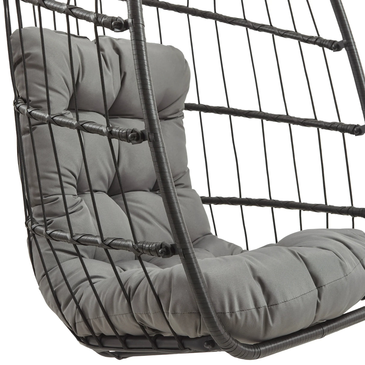 Black rattan hanging egg chair featuring a plush gray cushion, designed for comfort and stylish outdoor relaxation