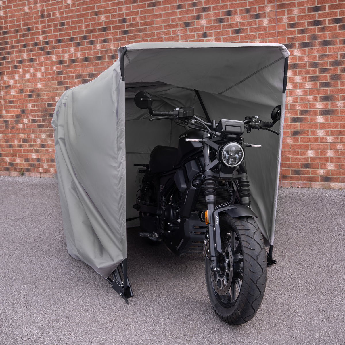 Large grey motorbike tent with a sturdy frame, featuring a spacious entrance and weather-resistant fabric, ideal for motorcycle protection