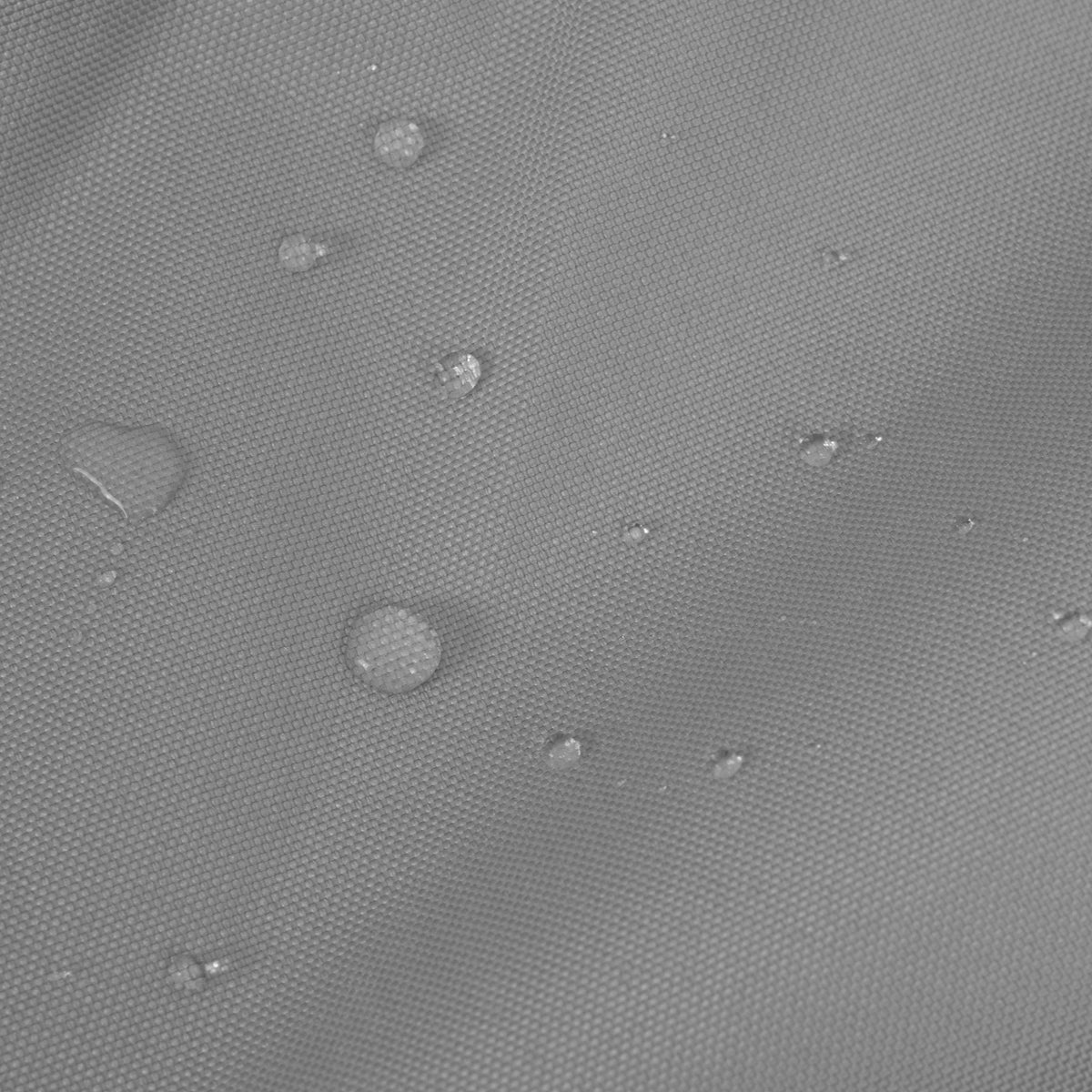 Water-resistant grey fabric of an XL motorbike tent, featuring a textured surface with droplets, ideal for outdoor protection