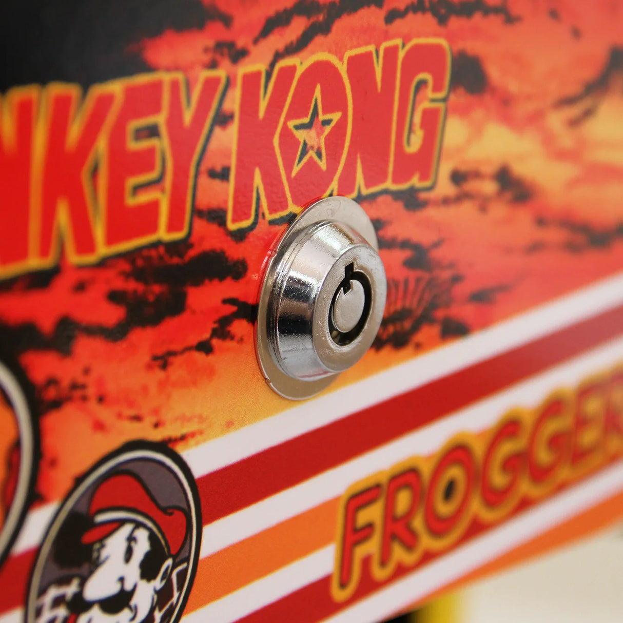 Close-up of the Retro Cocktail Table Arcade Games Machine featuring vibrant artwork with Donkey Kong and Frogger, showcasing a shiny metal lock
